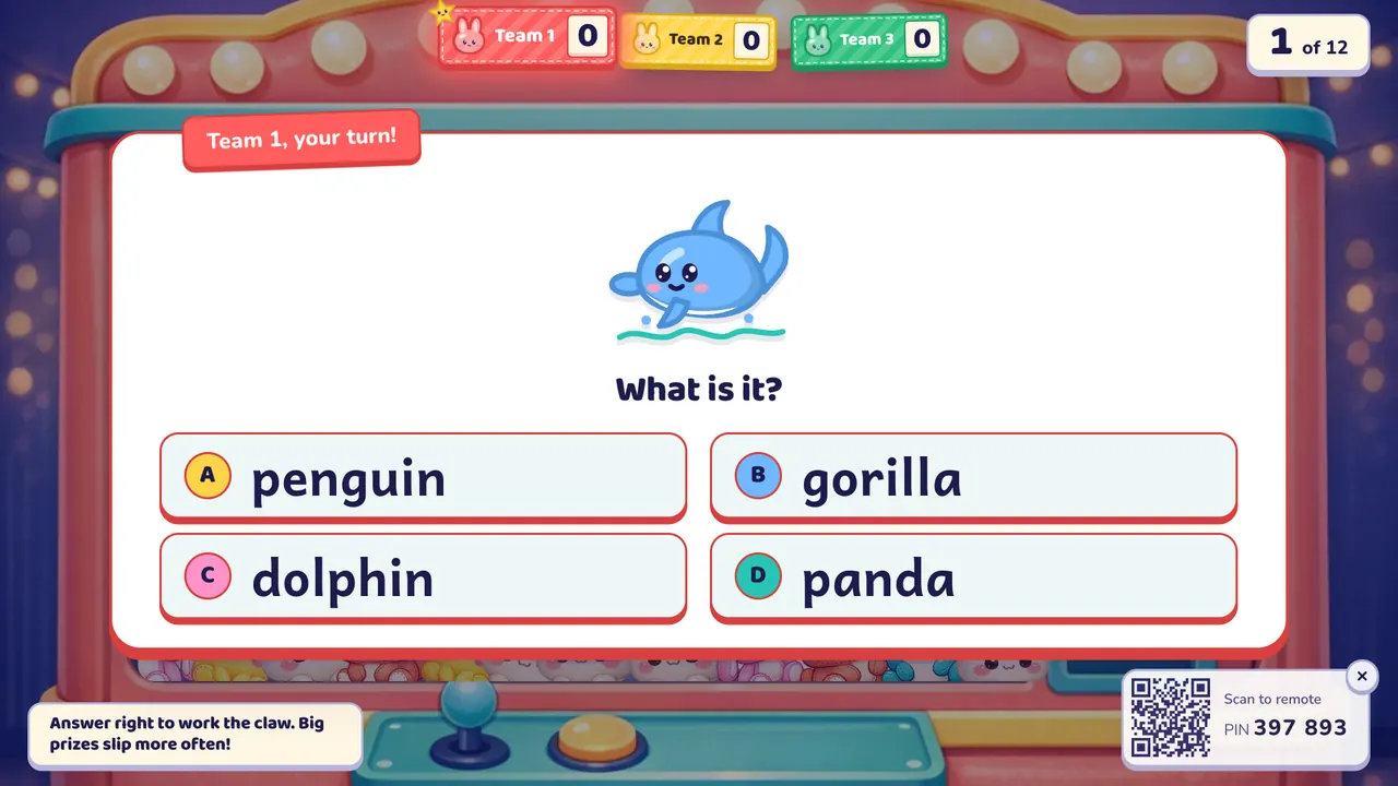 A question card over the claw machine: a dolphin picture, "What is it?" and four answers, with "Team 1, your turn!"
