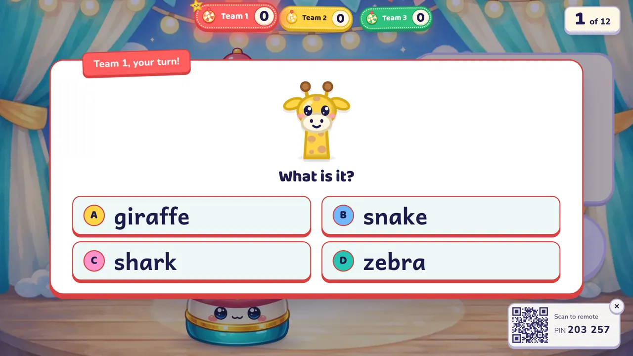 A Lucky Wheel question: a cartoon giraffe with "What is it?" and four answers, giraffe, snake, shark and zebra, with "Team 1, your turn!" above